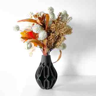 Bright floral decor in modern black 3D printed vase for stylish home or office decoration.