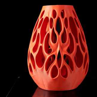 Vase with intricate lattice design, showcasing advanced 3D printing technology at AM Square 3D.