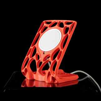 Highly detailed 3D printed wireless charger stand with intricate lattice structure.