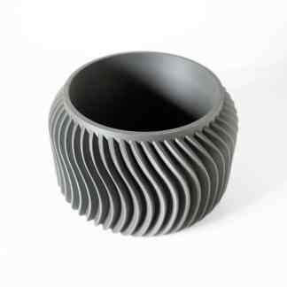 High-resolution 3D printed metallic gear showcasing intricate design.
