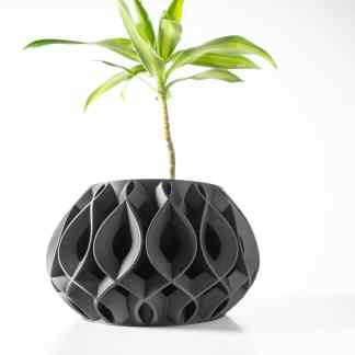 Advanced 3D printed vase with intricate geometric design, showcasing innovative additive manufacturing technology.