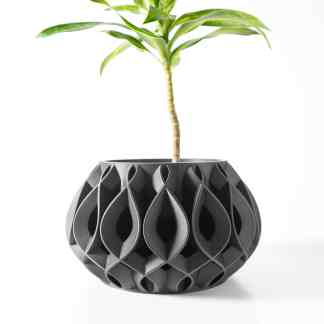 Black 3D-printed geometric plant vase with a sleek, modern design for contemporary interior decoration.