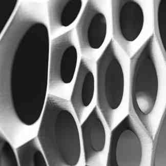 Highly detailed metal 3D printed honeycomb structure for engineering applications.