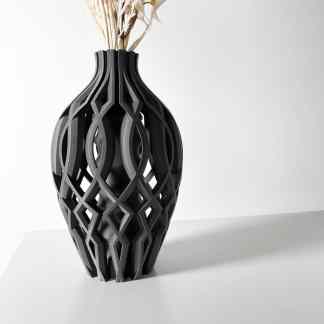 3D-printed black geometric vase with complex lattice pattern, ideal for contemporary interior decoration.