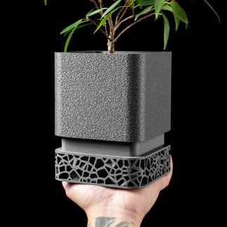 A 3D printed plant pot showcasing complex geometric patterns and contemporary style.