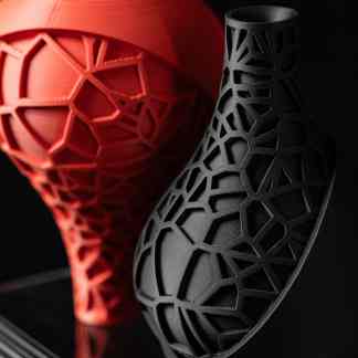 Highly detailed 3D-printed decorative vases in black and red, showcasing intricate geometric lattice designs.