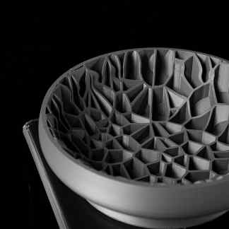 High-resolution 3D-printed honeycomb structure on black background, showcasing advanced manufacturing.