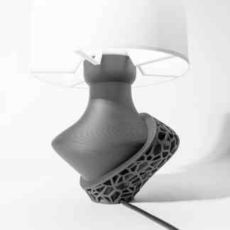 A sleek, contemporary VORI lamp featuring intricate geometric base design, perfect for stylish interiors.