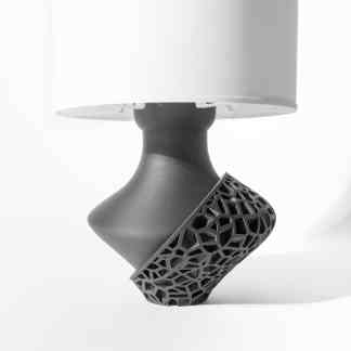 Modern 3D printed lamp base with intricate geometric design, showcasing innovative additive manufacturing technology.