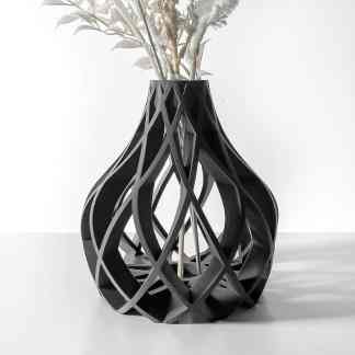 Black geometric vase with intricate lattice design, ideal for stylish interior decoration.