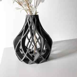 Intricate black 3D-printed vase with geometric design for modern interior styling.
