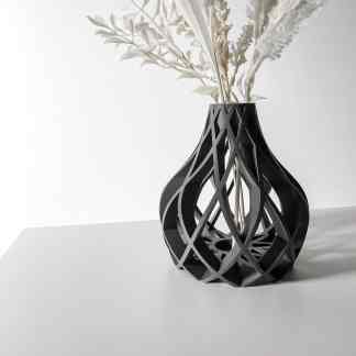 Vase with intricate geometric 3D printed pattern for contemporary home decor.
