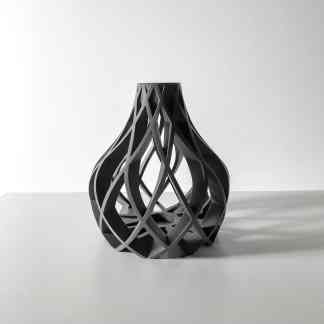 Elegant black 3D-printed vase showcasing intricate latticework features.