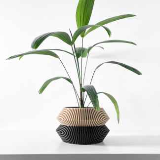 3D printed elegant planter with unique geometric design, ideal for stylish home or office plant display.