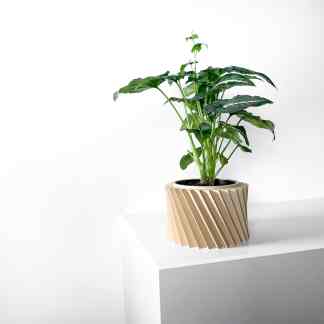 Modern 3D printed plant pot with ribbed design for stylish home decor.