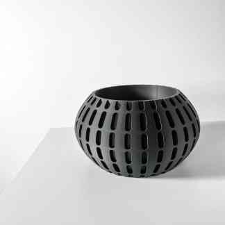 Contemporary black 3D-printed planter with ergonomic design for indoor plants.