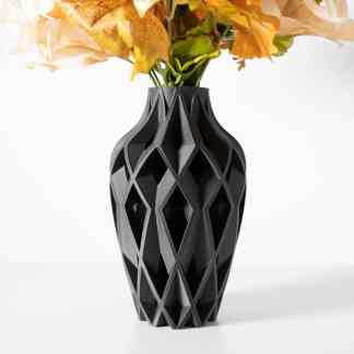 Black 3D printed vase with geometric lattice pattern, perfect for modern home decor.