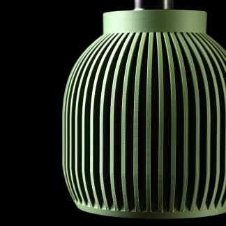 Elegant 3D illustration of a green pendant lamp with vertical slats against a black background, showcasing modern lighting design.