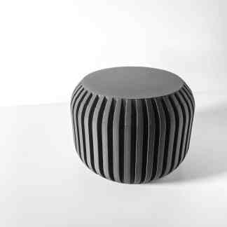 Minimalist black 3D-printed speaker with ribbed design using advanced additive manufacturing technology.