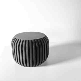Stylish 3D-printed black speaker with vertical slats, perfect for modern interior decor and audio tech.