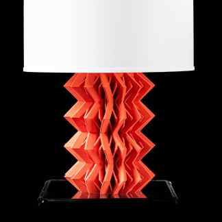Modern zigzag-designed 3D printed table lamp with white shade. Unique home decor made with innovative 3D printing.