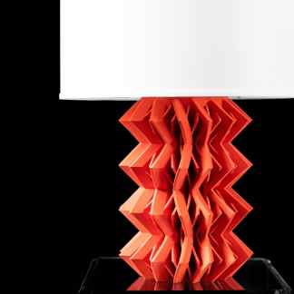 Innovative 3D-printed lighting sculpture showcasing intricate geometric patterns on a black background.