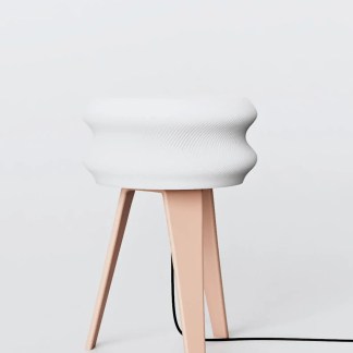 Sleek white 3D-printed table lamp with textured surface on a modern wooden tripod stand, ideal for stylish home decor.