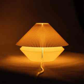 Elegant table lamp ideal for cozy living spaces and bedside lighting.