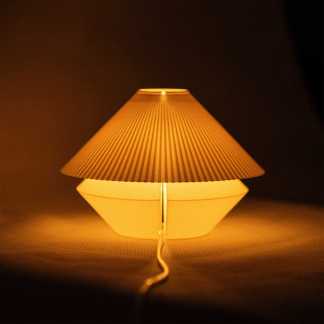 Elegant Chinese table lamp with traditional design and warm glow, perfect for cozy home decor.