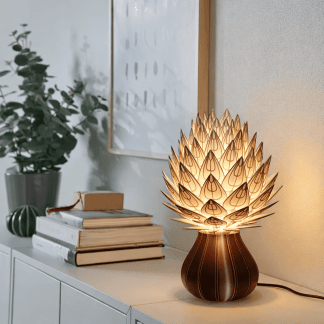 Prisma petal lamp with wooden petals, creating a warm, ambient glow for modern interiors.