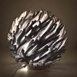 Inspired 3D-printed lamp with LED illumination, perfect for contemporary home decor.