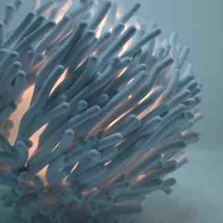 Inspired 3D-printed lamp with soft illumination, perfect for contemporary home decor.